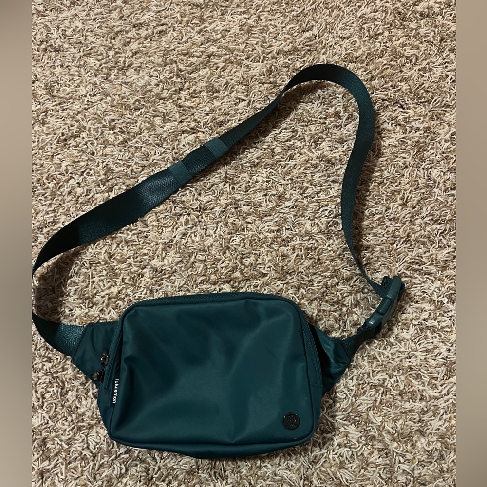 Dark Green lulu lemon everywhere belt bag with long strap